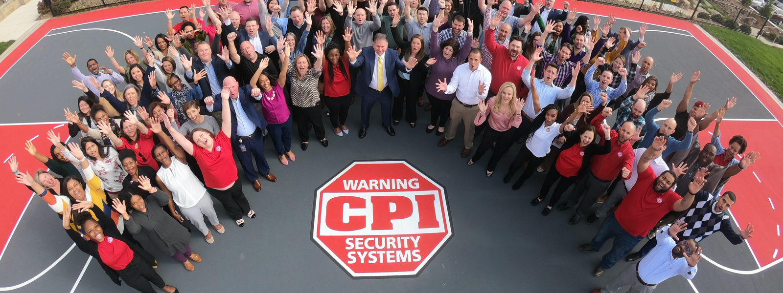 Full staff of CPI Security cheering